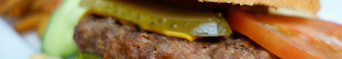 Eating Burger at Betty's Place restaurant in Toledo, WA.